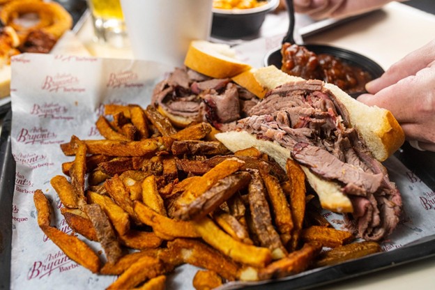 Tray of a bbq brisket sandwich and french fries from Arthur Bryant’s in Kansas City