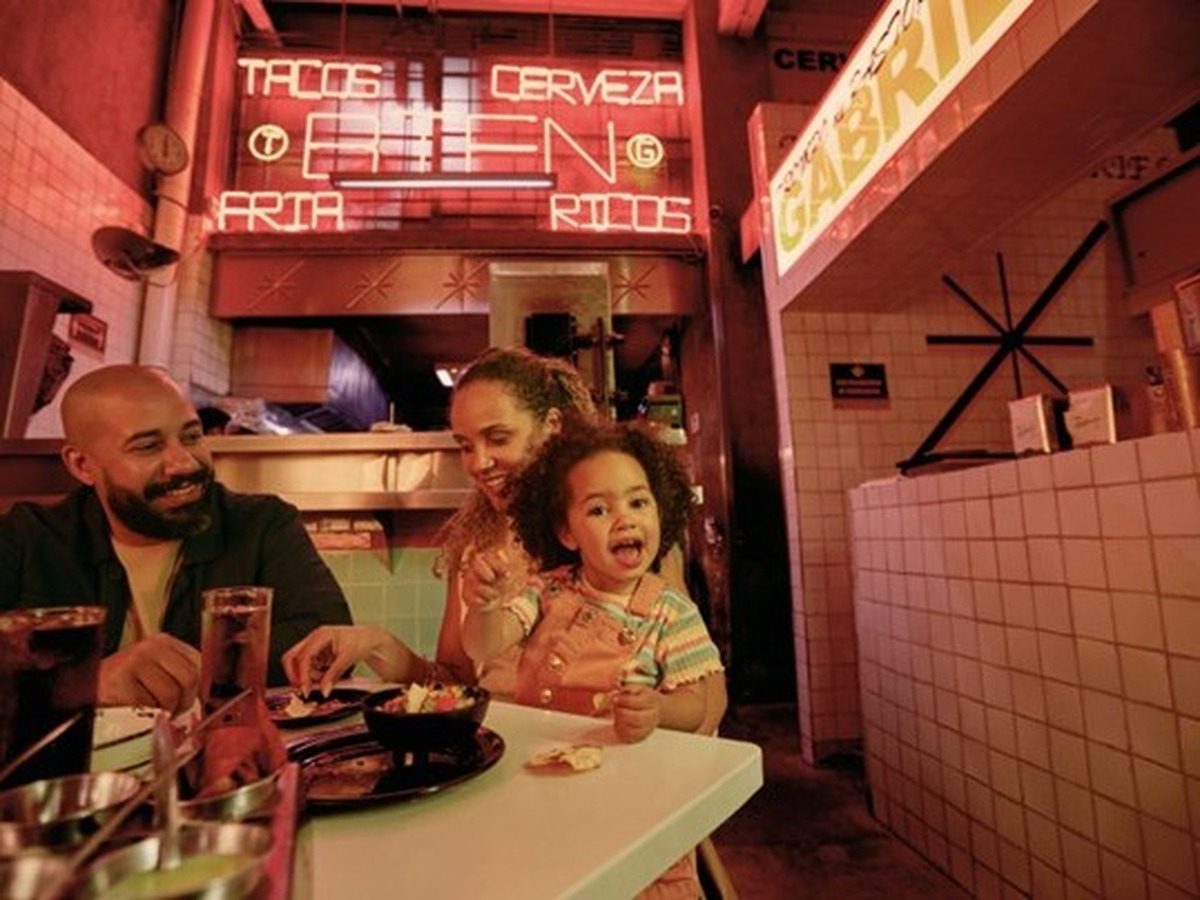 Happy family having food in restaurant