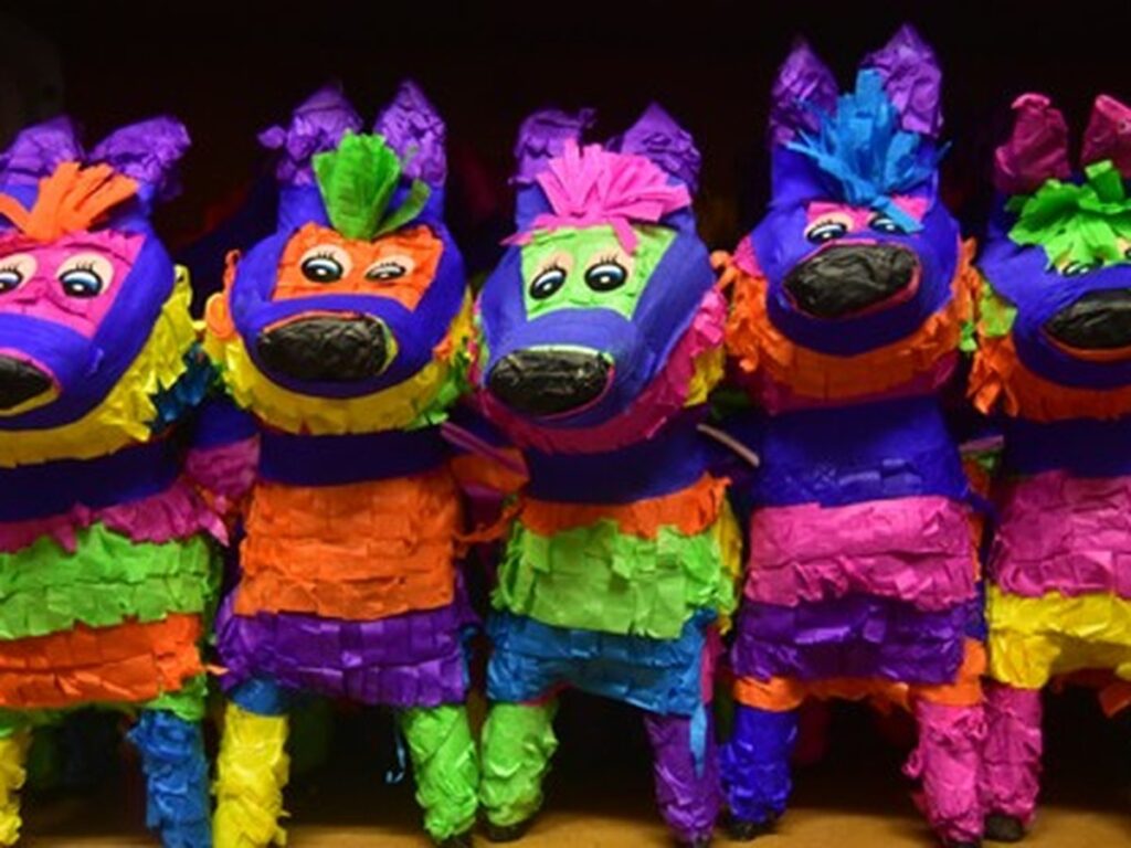 Colorful donkey piñatas displayed at a market during Fiesta in San Antonio, Texas