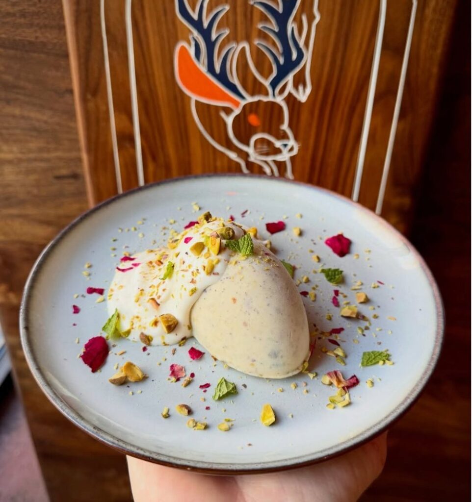 Banana Kulfi on a plate served at The Antler Room in Kansas City