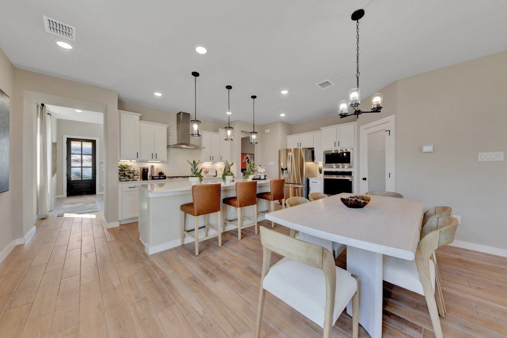 Hakes Brothers model home kitchen and dining room interior
