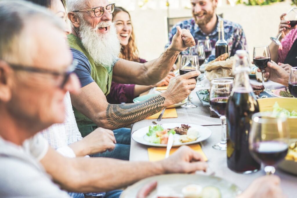 Group of friends dining outside together.