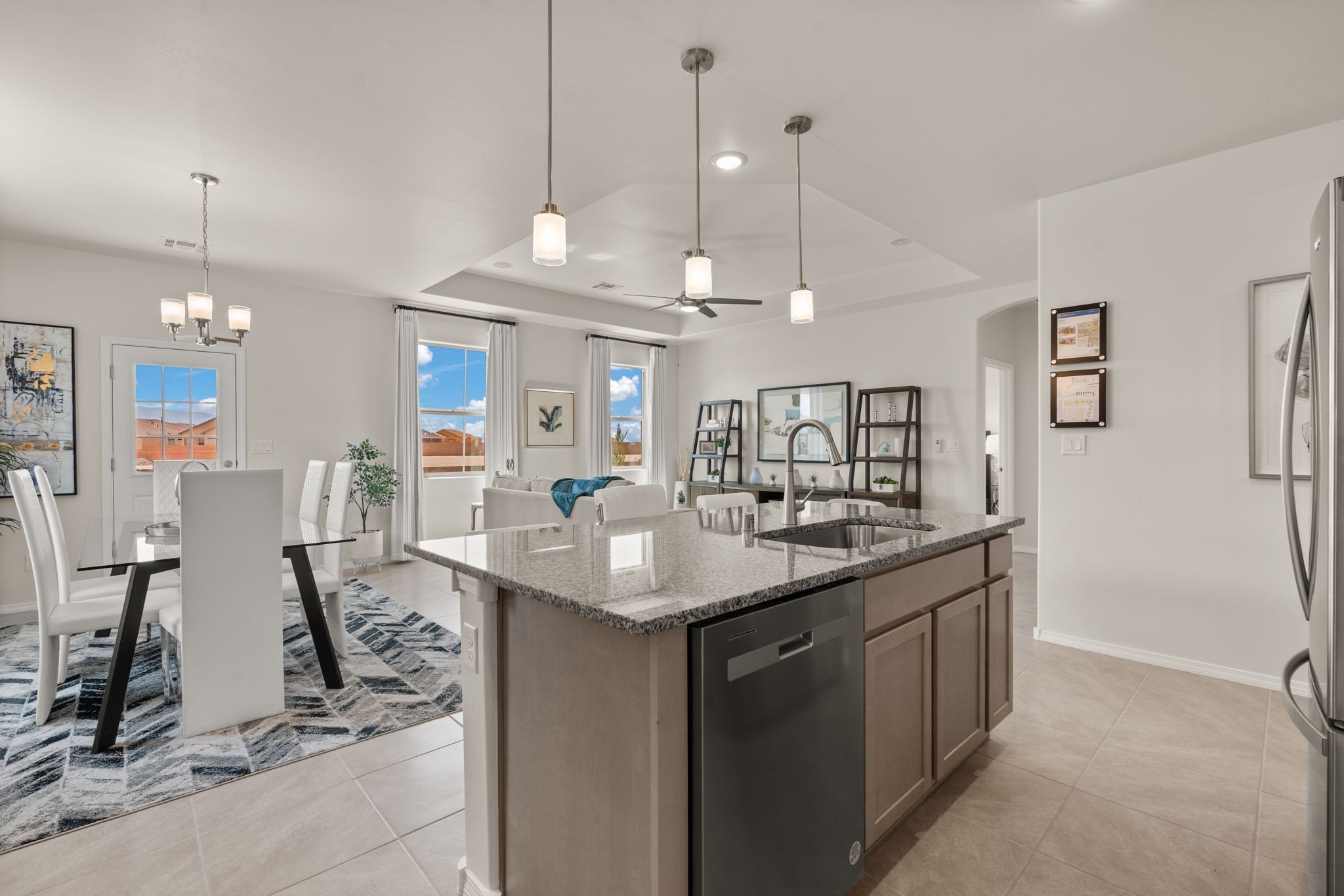 1522 Sophora Tuscan Kitchen view into great room and dining area